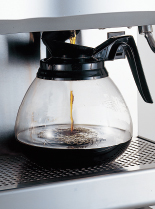 Folded nozzles allow dispensing to decanters.