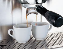 Folded nozzles allow dispensing to decanters.