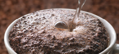 Folded nozzles allow dispensing to decanters.