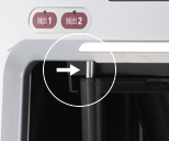Folded nozzles allow dispensing to decanters.